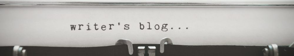 Top of a typewriter that says "writer's blog..."
